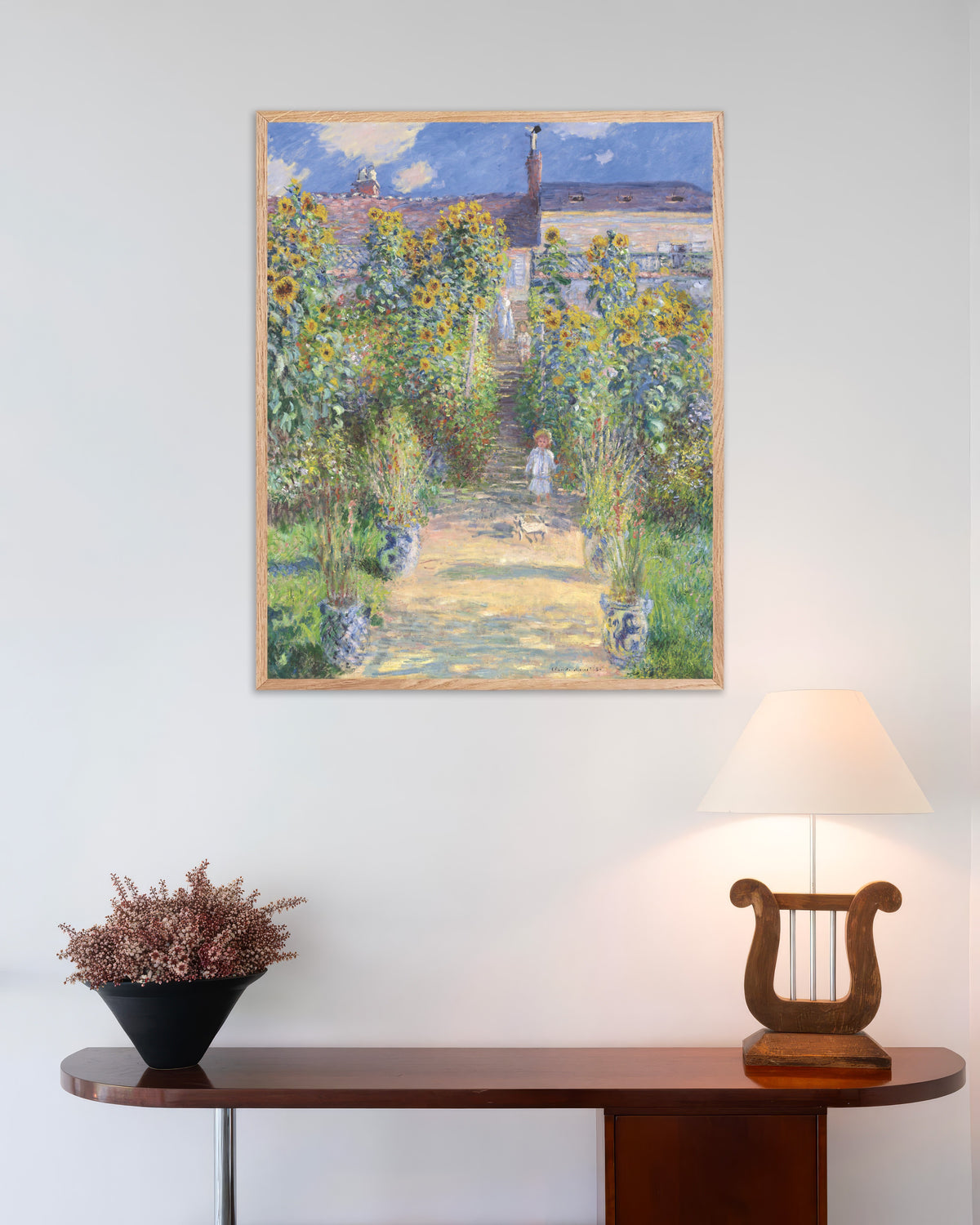 Poster De tuin van de kunstenaar in Vétheuil (1881) van Claude Monet met naturel houten lijst