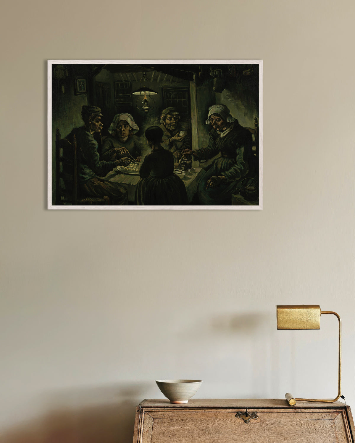 Poster De aardappeleters (1885) van Vincent van Gogh, met witte houten lijst