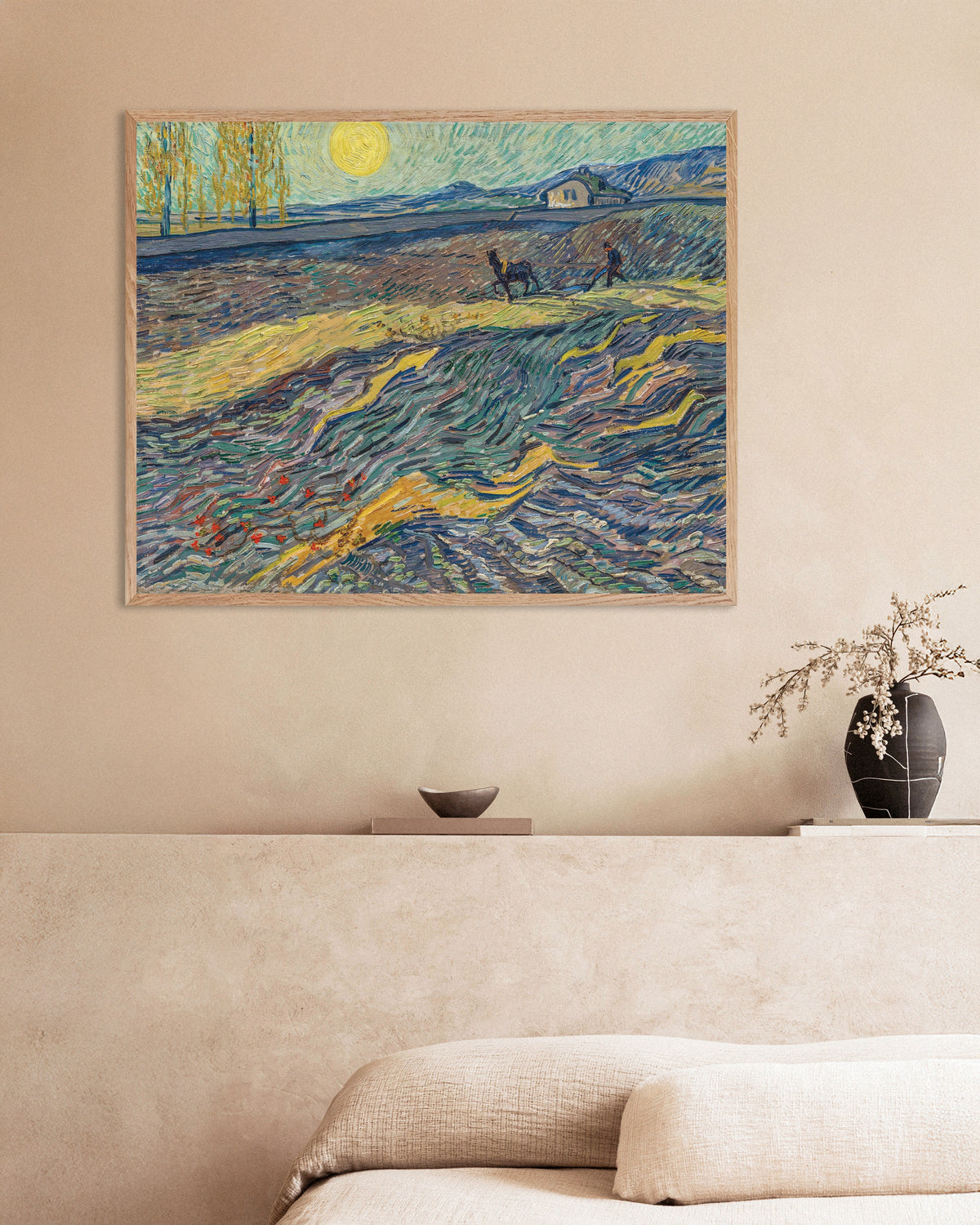 Poster van Omheind veld met ploegende boer (1889) van Vincent van Gogh, met naturel houten lijst