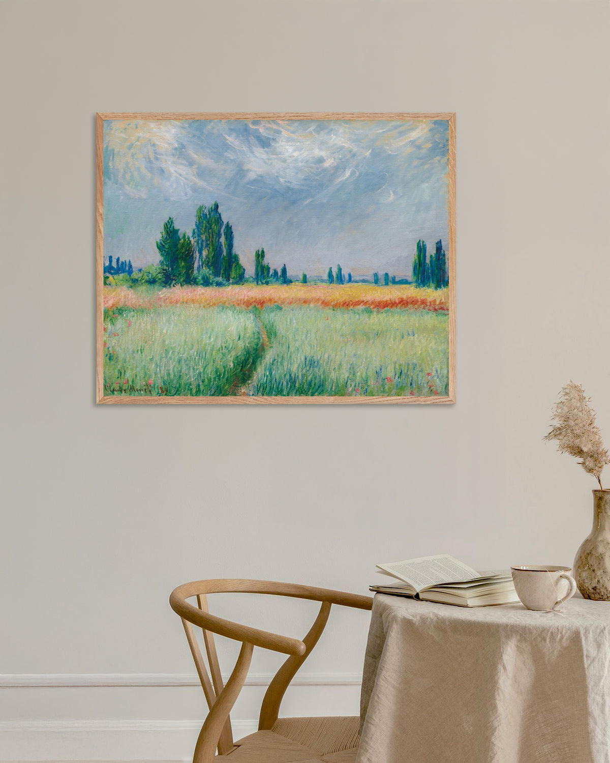 Poster Korenveld (1881) van Claude Monet met naturel houten lijst