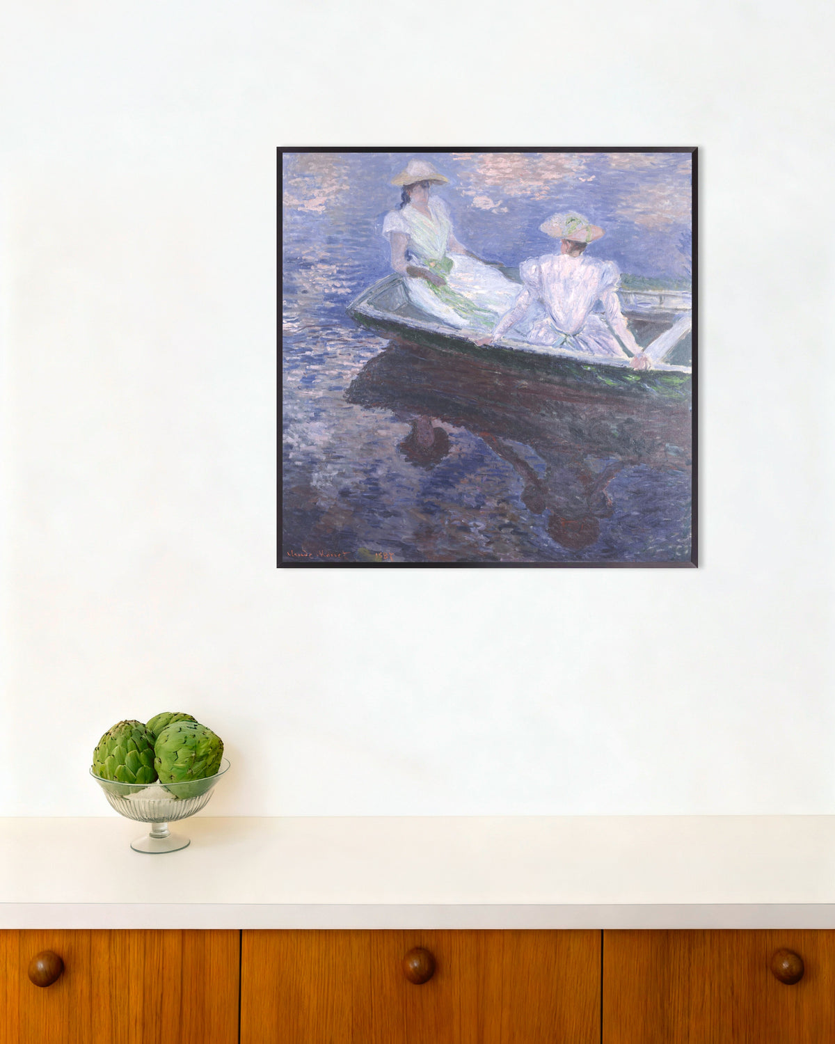 Poster Meisjes in een boot (1887) van Claude Monet met metalen lijst